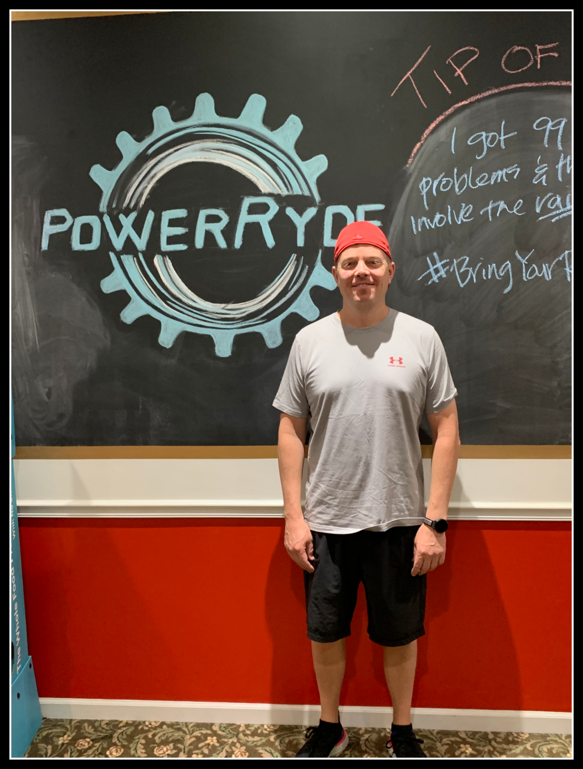 Jason Heinen in front of chalk PowerRyde logo